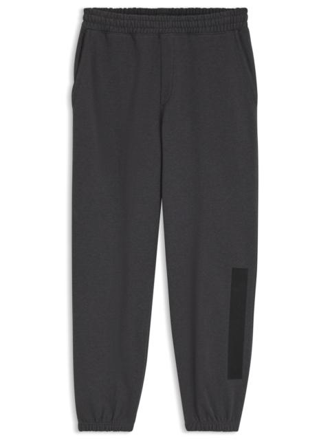 HUGO RELAXED-FIT SWEATPANTS IN COTTON WITH LOGO TRIM