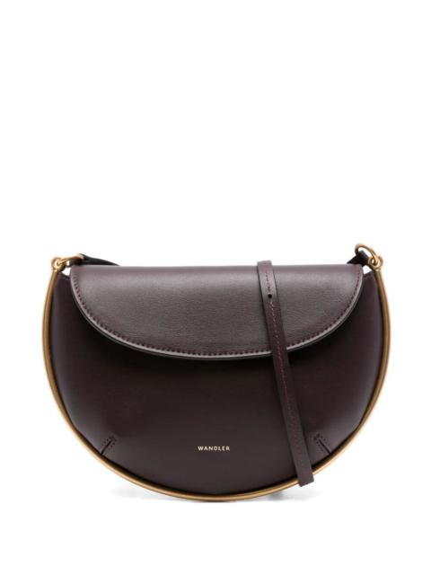 WANDLER The KATE Mini Crossbody by WANDLER is a luxurious accessory that elevates any outfit. Made from high