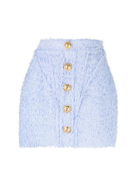button-embellished tweed miniskirt
