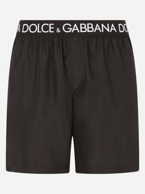 Dolce & Gabbana Mid-length swim trunks with branded stretch waistband