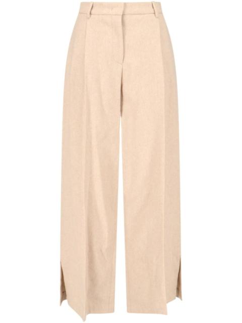 The . Garment side slit trousers