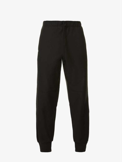 Logo-embroidered relaxed-fit cotton-blend jogging bottoms