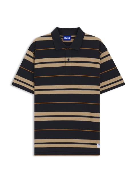 HUGO REGULAR-FIT POLO IN COTTON PIQUE WITH ENGINEERED STRIPES