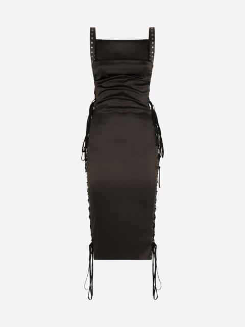 Satin calf-length dress with laces and eyelets