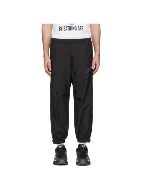 A BATHING APE® Black Color Camo Deformation Track Pants