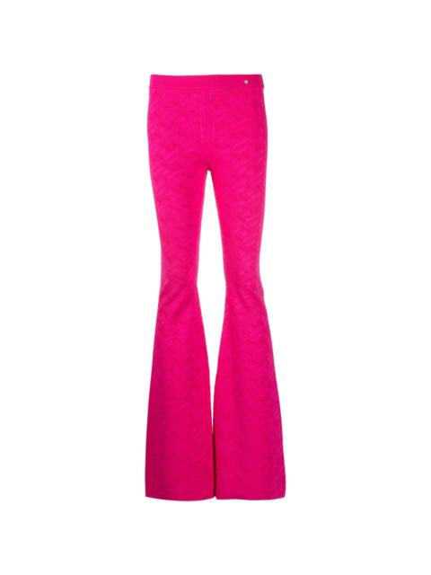 VERSACE La Greca-pattern flared trousers
