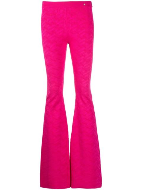 VERSACE La Greca-pattern flared trousers