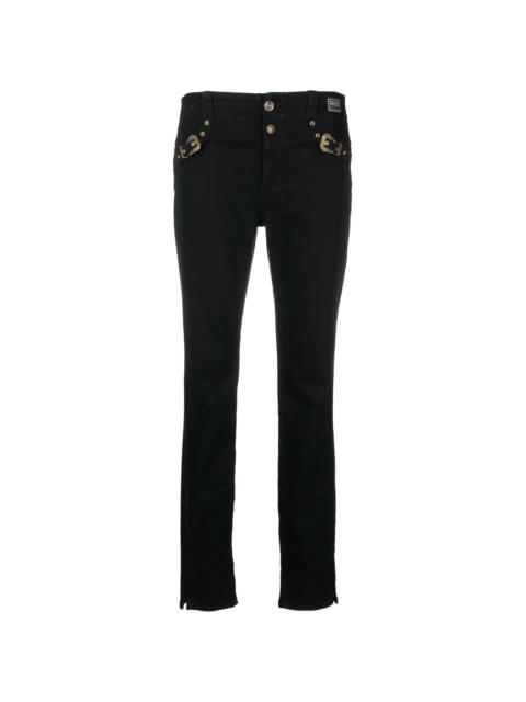 decorative buckle skinny trousers