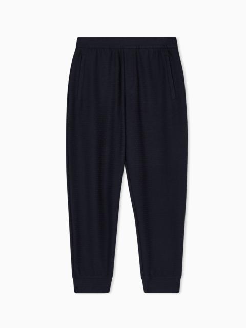 EMPORIO ARMANI LYOCELL-BLEND INTERLOCK-JERSEY JOGGERS WITH JACQUARD LETTERING