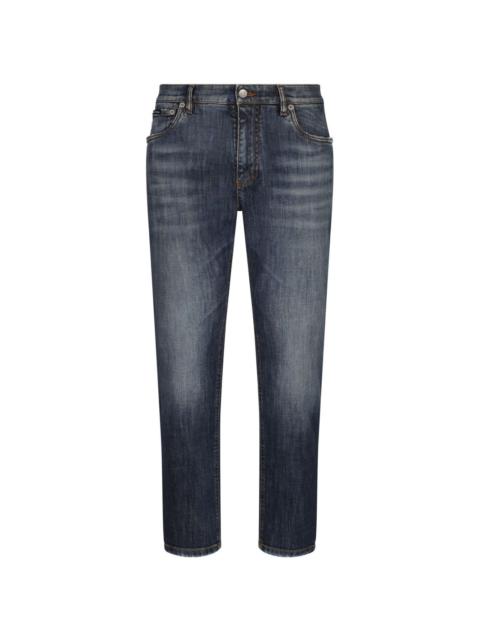 washed tapered jeans