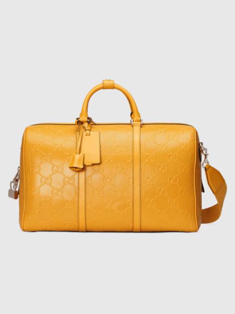 GUCCI GG embossed duffle bag