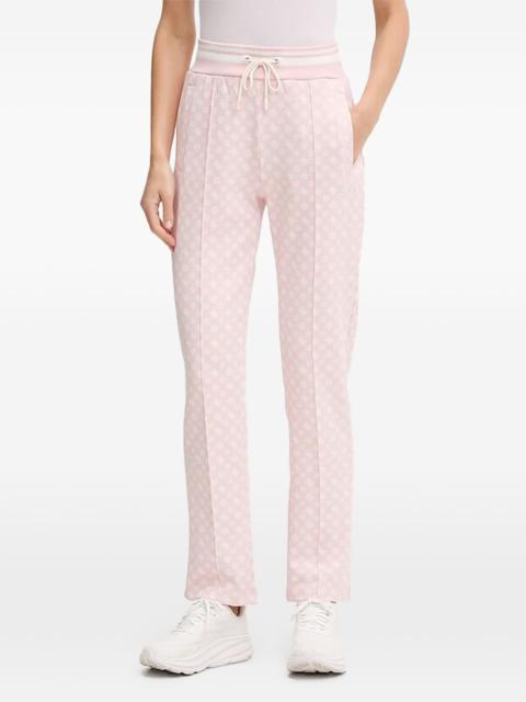 GUESS USA logo-patterned track pants
