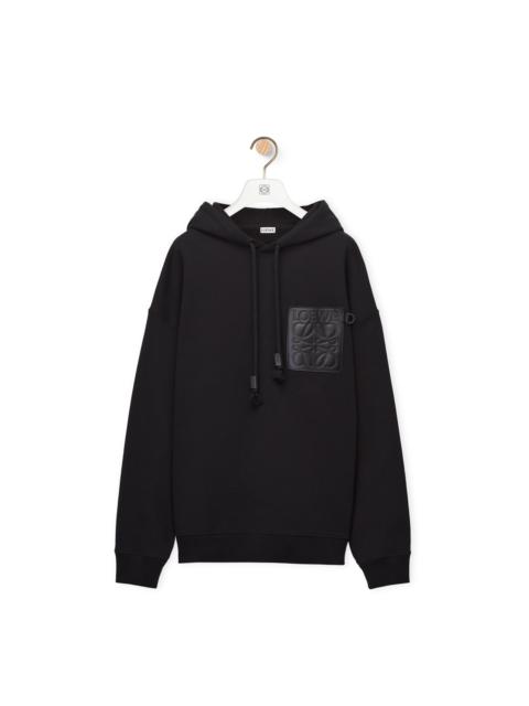 Anagram patch pocket hoodie in cotton