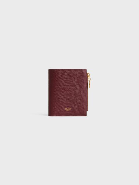 CELINE COMPACT WALLET TRIOMPHE CHARMS IN GRAINED CALFSKIN
