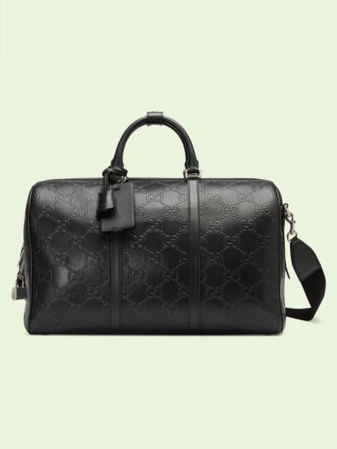 GUCCI GG embossed duffle bag