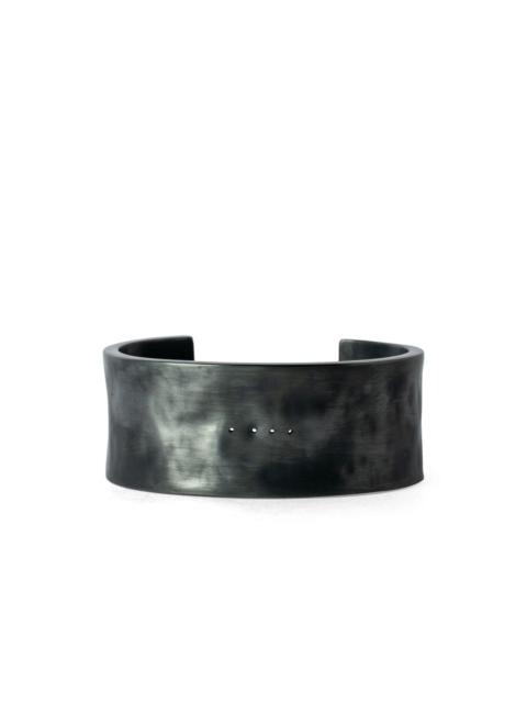 Parts of Four Ultra Reduction band bracelet