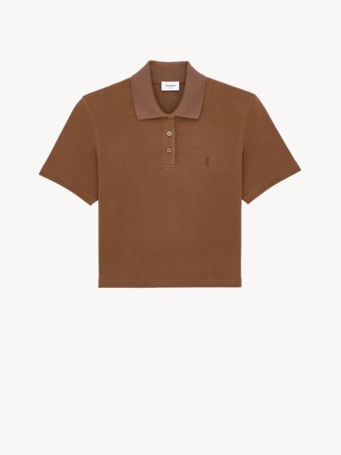 SAINT LAURENT CASSANDRE CROPPED POLO IN COTTON PIQUÉ