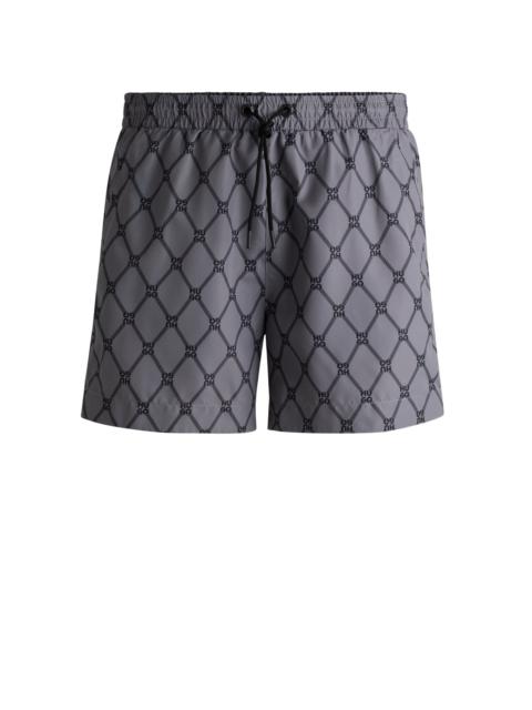 HUGO SWIM SHORTS WITH STACKED-LOGO PRINT