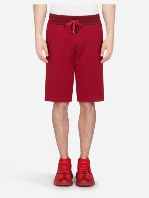 Jersey bermuda jogging shorts with small logoed plaque