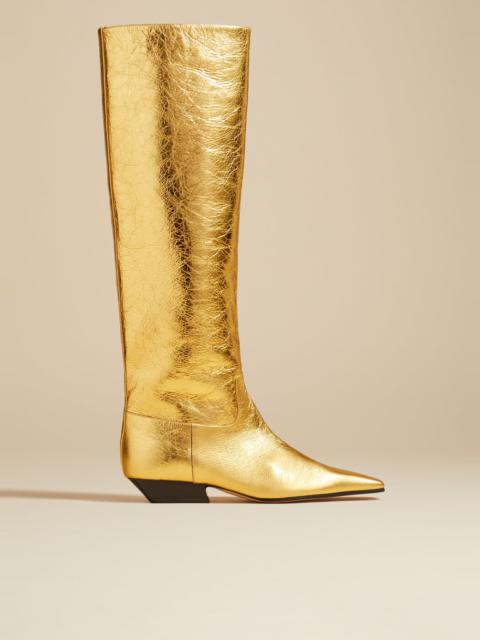 KHAITE The Marfa Knee-High Boot in Gold Metallic Leather