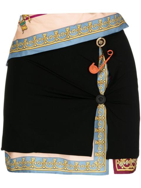 VERSACE safety-pin slash mini skirt