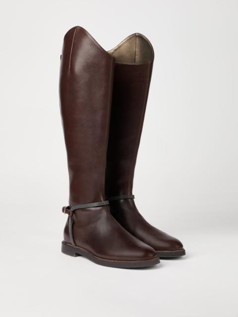Classic leather boots with precious spurs