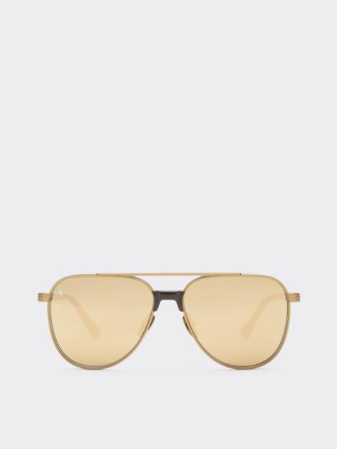 Ferrari Ferrari sunglasses in matte gold titanium and acetate with transparent yellow-gold mirrored lenses