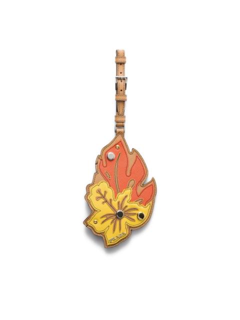 Prada leaf-shaped name tag