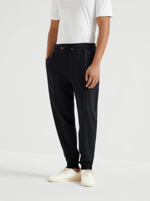 Brunello Cucinelli Techno cotton French terry trousers with elasticated zipper cuffs, Crête detail and piping