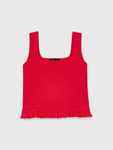 maje Ruffled knit top
