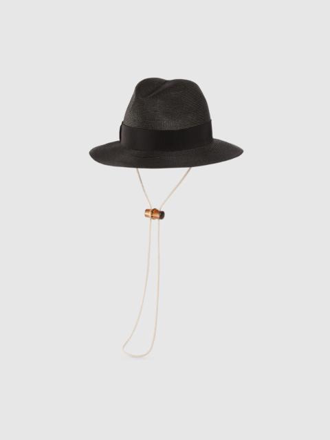 GUCCI Raffia-effect wide-brimmed hat with bow