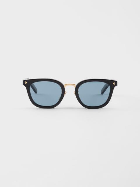 Prada Sunglasses with the iconic metal plaque
