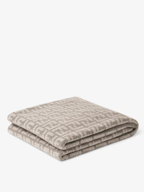 FENDI Two-tone soft cashmere blanket with FF motif in natural dove gray and white tones. Designed by Karl 
