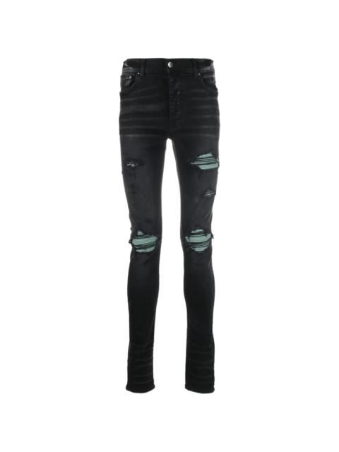 AMIRI ripped skinny jeans