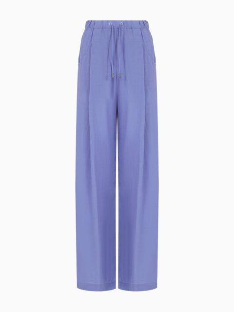 Palazzo trousers in a fluid fabric