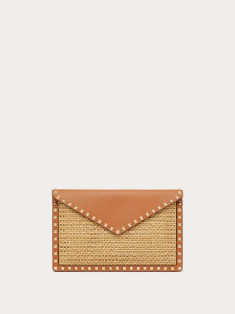 ROCKSTUD RAFFIA CLUTCH BAG