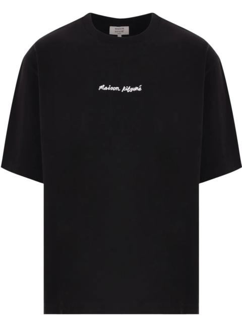Maison Kitsuné Introducing the "MAISON KITSUNÉ LINE HANDWRITING" OVERSIZE TEE-SHIRT, a striking piece from the reno