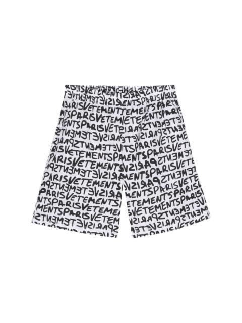 VETEMENTS logo-print cotton shorts