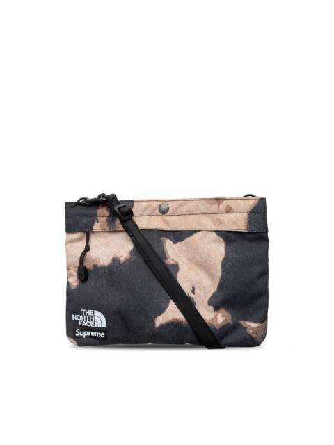 x TNF bleached denim print shoulder bag