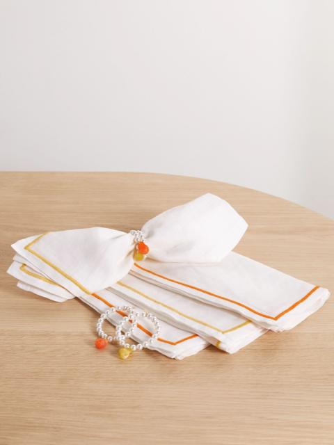Completedworks + Sister by Studio Ashby set of four linen napkins and faux pearl and resin napkin rings Orange