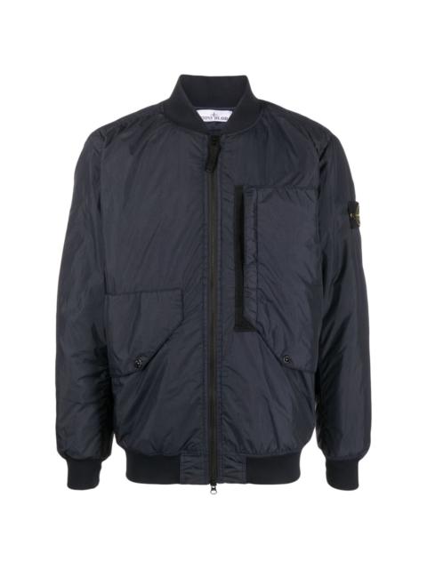 Compass-badge panelled bomber jacket