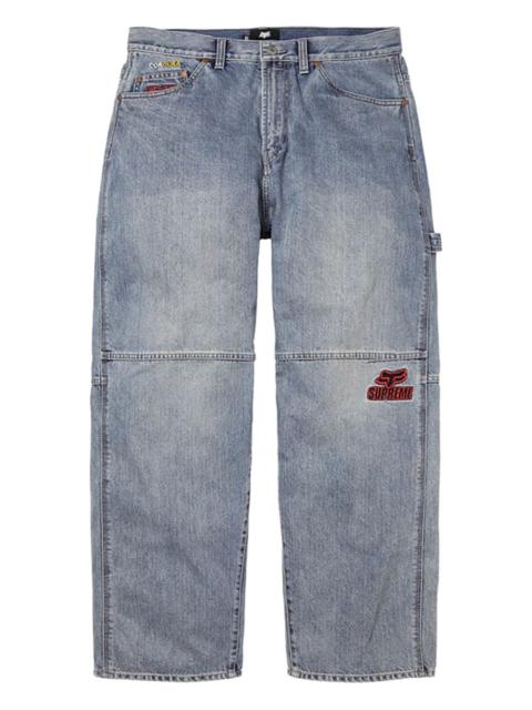 Supreme x Fox Racing® logo-detailed jeans