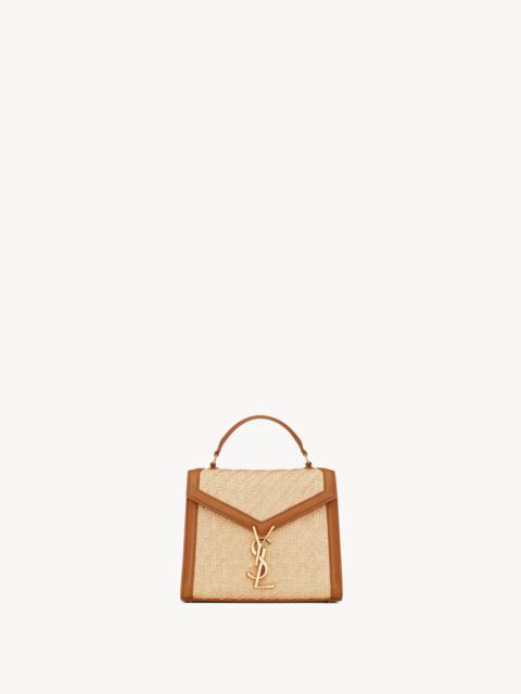 SAINT LAURENT CASSANDRA MINI TOP HANDLE BAG IN RAFFIA AND VEGETABLE-TANNED LEATHER