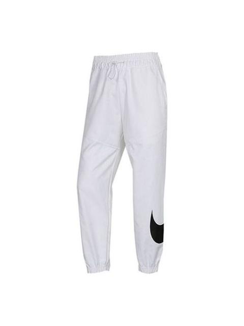 Nike (WMNS) Nike Sportswear Swoosh 로고 인쇄 길쌈된 스포츠 바지 백색 CJ3777-100