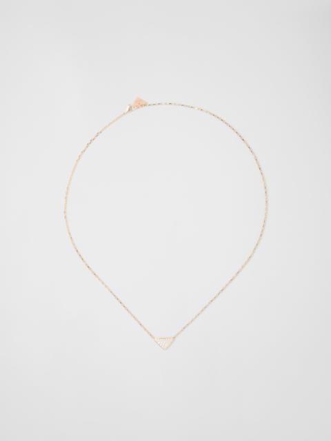 Eternal Gold micro triangle pendant necklace in yellow gold and diamonds