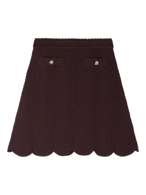 Sandro button-detail scallop-hem knitted skirt