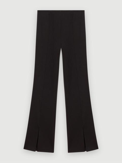 Black slim-fit trousers with slits