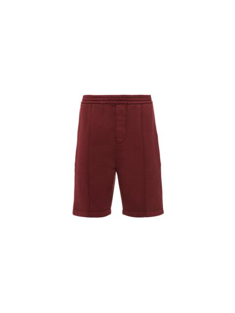 Prada Garment-dyed distressed cotton fleece Bermuda shorts