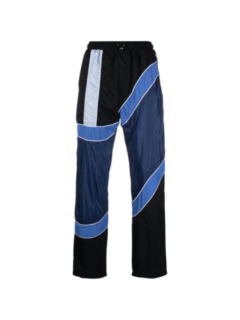 Ahluwalia colour-block stripe-detail trousers