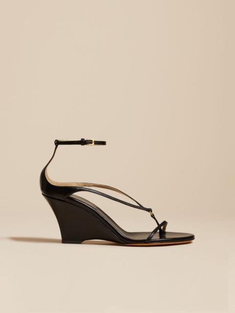 KHAITE The Marion Strappy Wedge Sandal in Black Leather
